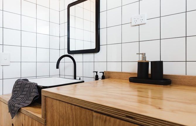 bathroom with black tapware